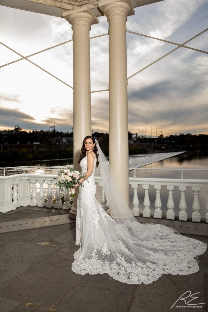 beautiful bride at Waterworks in Philadelphia with Hollywood hair and makeup