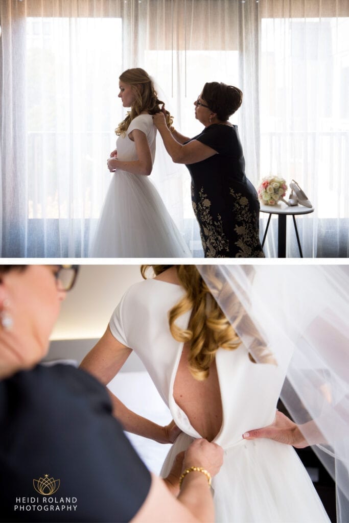 bride getting dressed on her wedding day