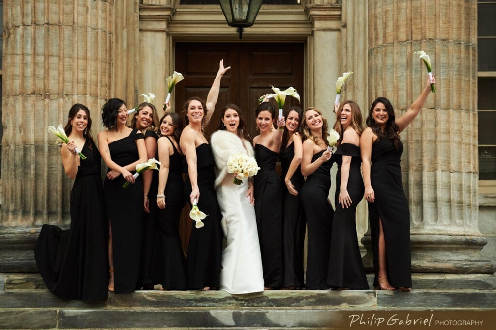 Bride and bridesmaids having fun