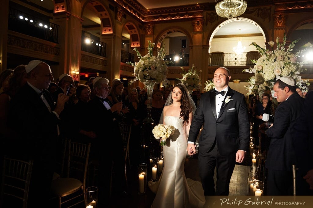 wedding at Ballroom at the Ben Philadelphia walking down the aisle