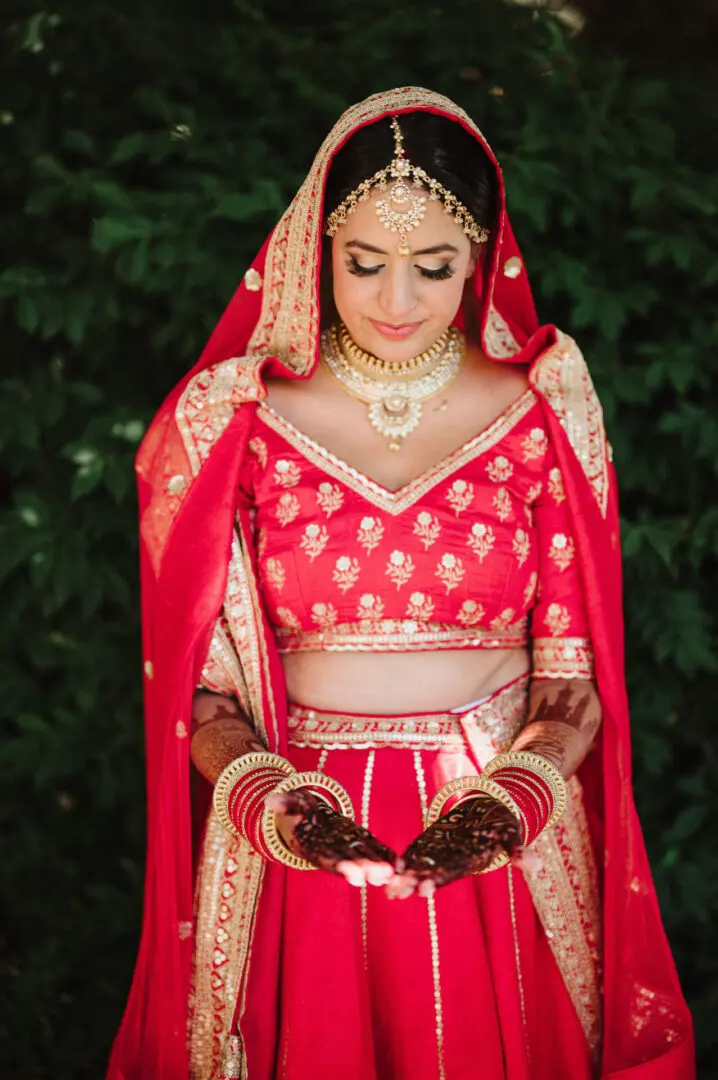 South Asian bride in red