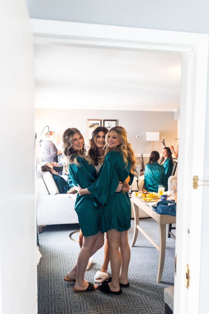 bride and maids dancing in robes